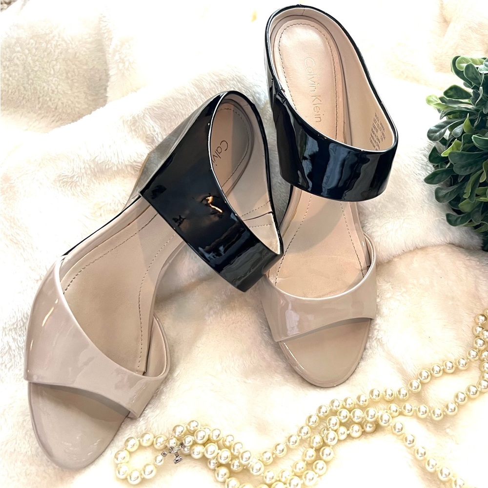 Calvin Klein, 2 1/2 inch slide/wedge. Tan/black.